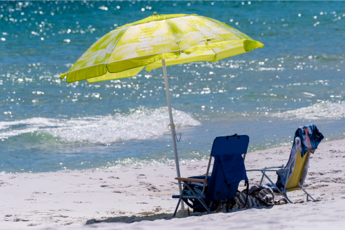 Chairs on the Beach with Yellow Umbrella 